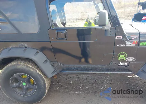2002 Jeep Wrangler Sahara z USA, uszkodzony, nr VIN 1J4FA59S32P744124